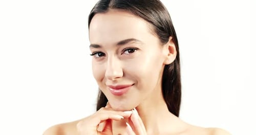 Woman Posing with Hands on Face Close Up