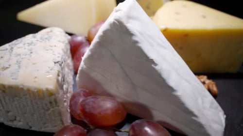 Selection of Gourmet Cheeses on Slate Platter