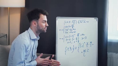 Young Adult Teaching Math at Home