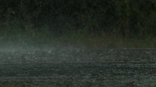 Raining on a road, slow motion