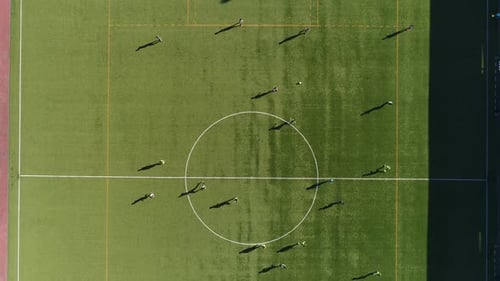 Aerial View of Soccer Players Training on Field