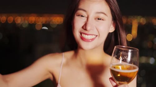 Young asian woman with sparklers is dancing and celebrating a new year.