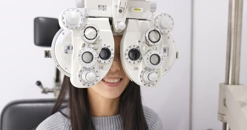 Woman undergo eye exam