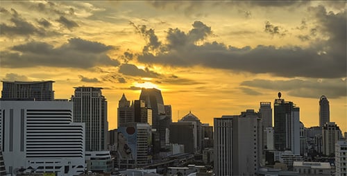 Orange Sunset over City Skyline