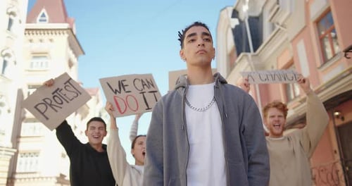 Mixed Race Man Protester Refusing Bribe Money