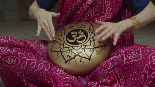 Woman Playing Handpan Drum Close Up