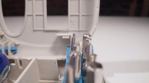 Set of Different Shaped Metal Heads for Screwdriver on Table