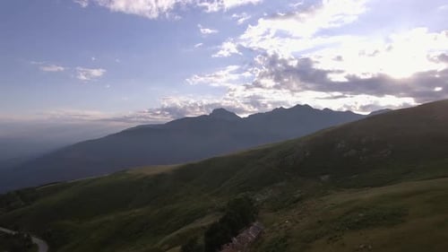 Bald Mountain in Summer Sunny Sunset or Sunrise Dawn or Dusk with Road and Lodge Aerial Drone