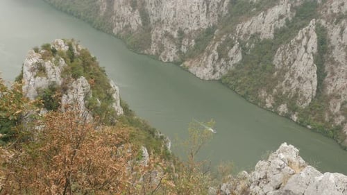 Boats and ships passing through narrow river gorge 4K 2160p 30fps UltraHD footage - Beauty of nature