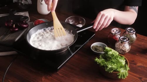 Creamy Sauce Cooking on Stove Top