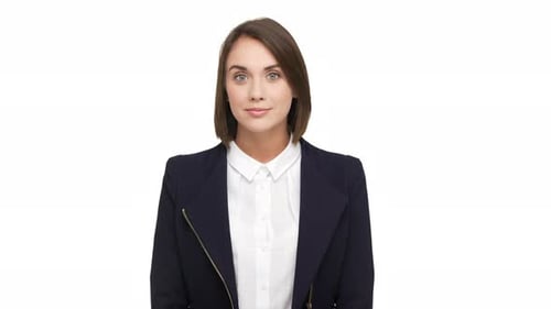 Portrait of Caucasian Shorthaired Woman with Beautiful Blue Eyes Wearing Business Suit Posing at