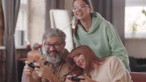 Family Playing Video Games Together at Home