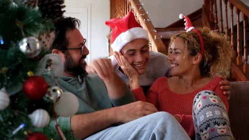 Loving Family Celebrating Christmas Together at Home