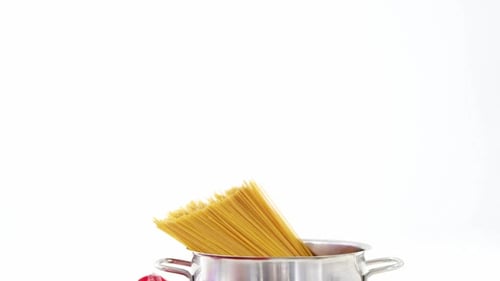 Raw spaghetti with cherry tomatoes and garlic