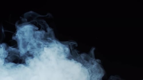 Abstract Blue Smoke Slowly Rising on Black