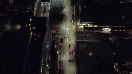 Epic City Aerial At Night Panning Lit Street To Skyline Skyscraper Building Lights