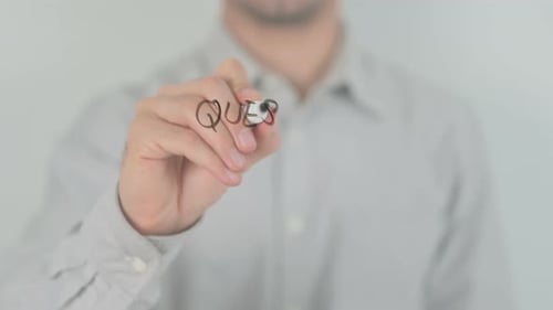 Hand Writes Questions and Answers with Marker