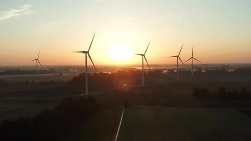 Wind Turbines Farm at Sunrise Aerial View