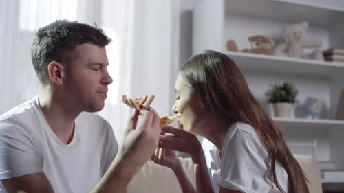 Eating Delicious Pizza