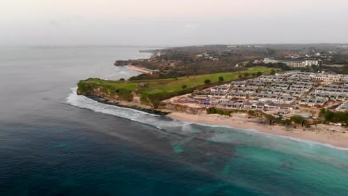 Aerial View of Sand Beach with Rocks and Green Cliff, Bali