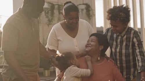 Family Celebrates Birthday Together at Golden Hour