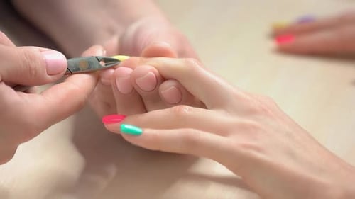 The Process of Cutting Cuticle Close Up.