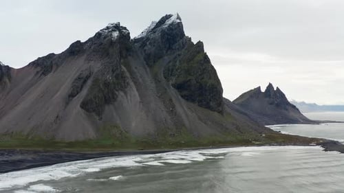 Drone Flight Over Sea Black Sand Beach And Vestrahorn Mountain