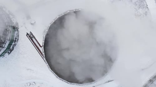 Dense Clouds of Steam Are Released From the Tower of the Thermal Power Plant