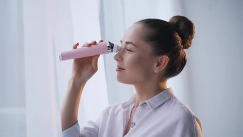 Girl Uses Face Pore Vacuum Cleaner