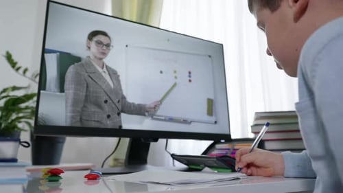 Education Online, Child Primary School Student Teaches Lessons with Female Teacher During Live