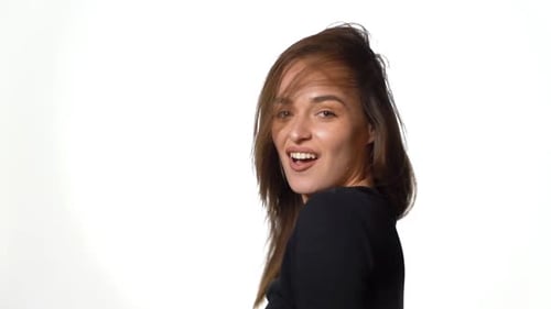 Woman Flips Her Long Brown Hair