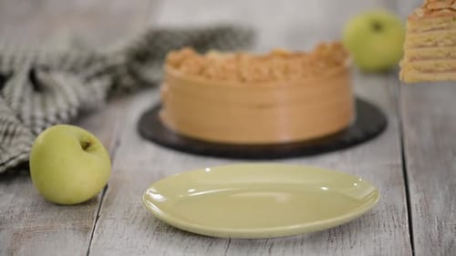 Layered Cake Slice Served on Plate