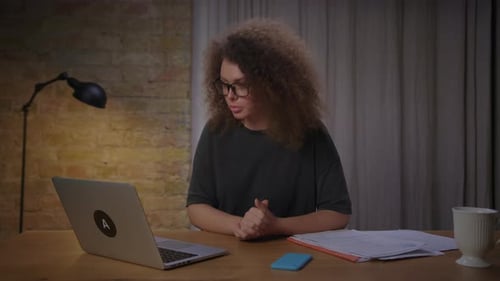 Woman On Video Call With Laptop At Home