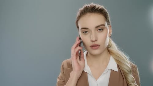 Young Adult Woman Talking on Mobile Phone