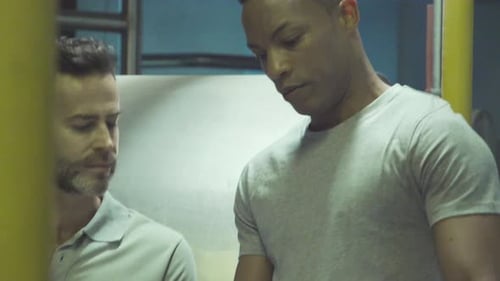 Industrial plant workers at work