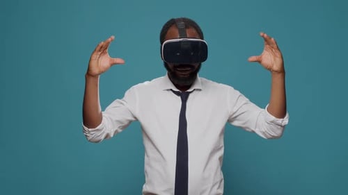 Male Freelancer Using Vr Glasses with Futuristic Vision in Studio