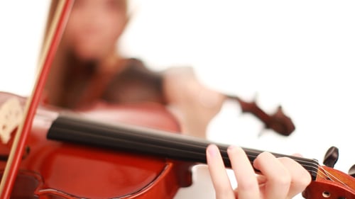 Close Up of Violin Performance in Studio