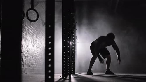 Silhouette d'un sportif faisant du burpee