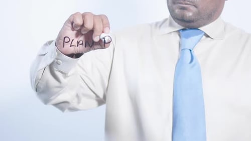 Indischer Geschäftsmann schreibt Plan B