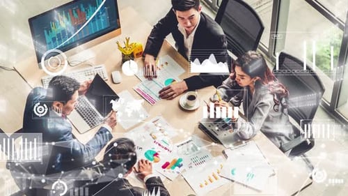 Business Team Brainstorming Data at Office Meeting