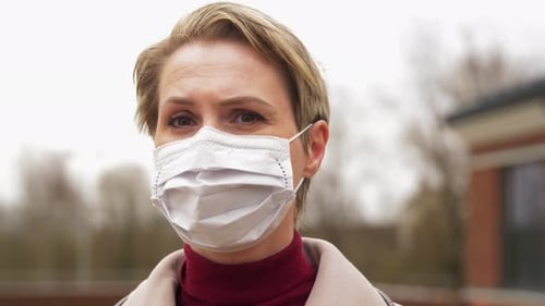 Young Woman Wearing Protective Medical Mask