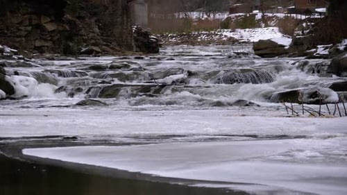 Wild Mountain River Flowing with Stone Boulders and Stone Rapids. Slow Motion
