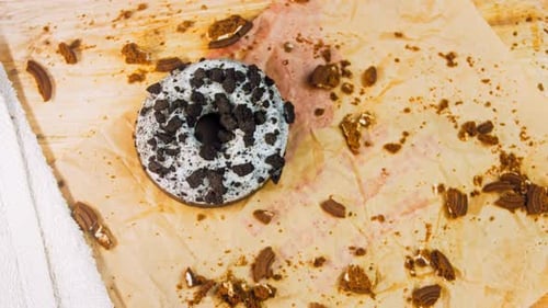 Cookie Crumb Donut on Paper Surface