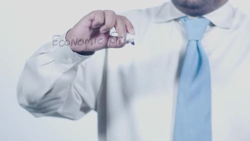 Asian Businessman Writes Economic Stimulus