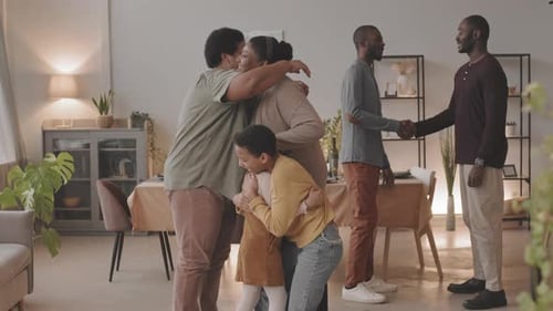 Family Members Greeting in Dining Room