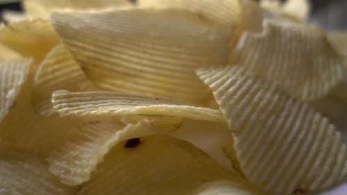 Golden Rippled Potato Chips Extreme Close Up