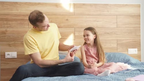 Father and Daughter Celebrate Birthday Together