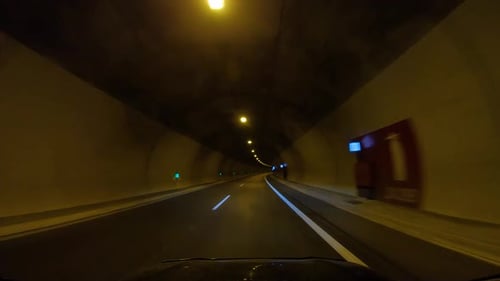 Road Trip on Europe Firstperson View of a Moving Car on a Highway Ride Inside the Tunnel Under the