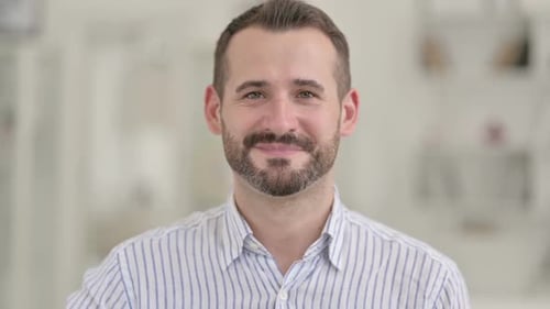 Man Smiling and Giving Thumbs Up