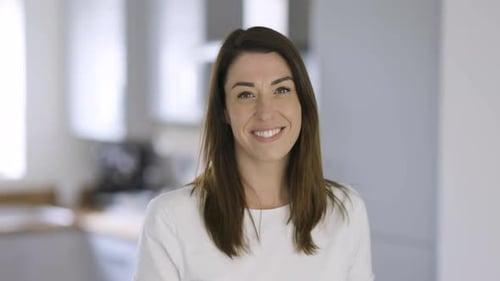 Smiling Woman Posing Indoors